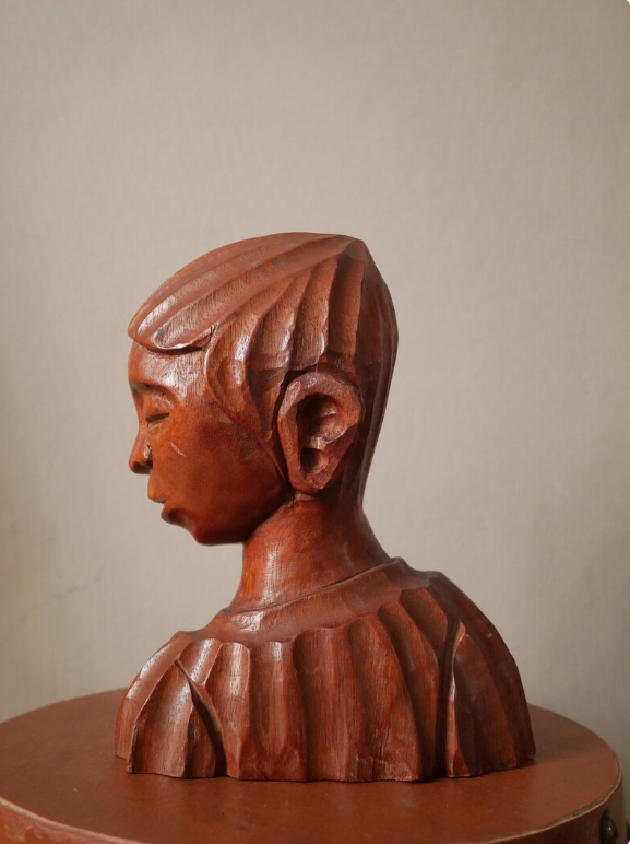 Carved wooden bust