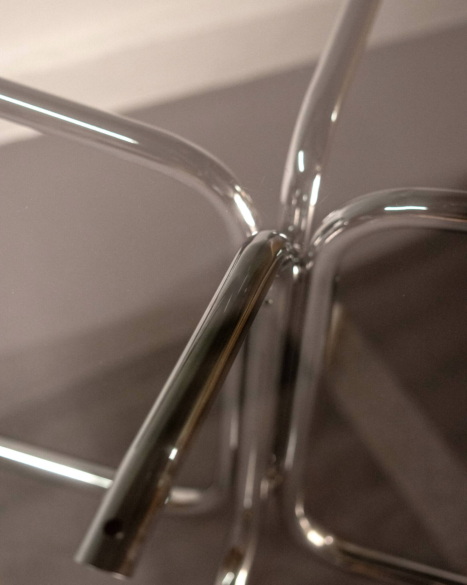 Round dining table in smoked glass and chrome-plated steel, Italy, 1970