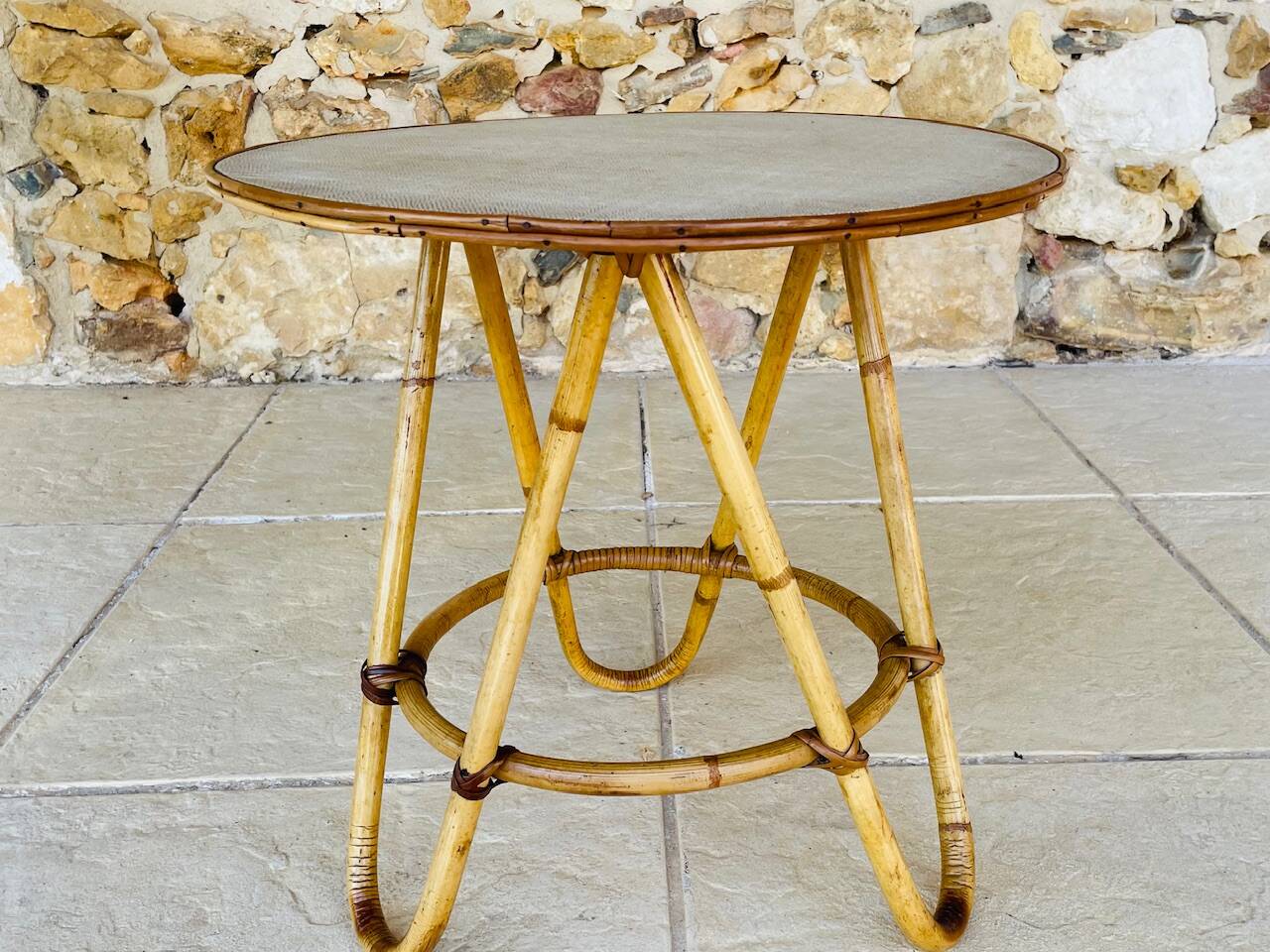 Vintage rattan and bamboo side table, circa 1969.