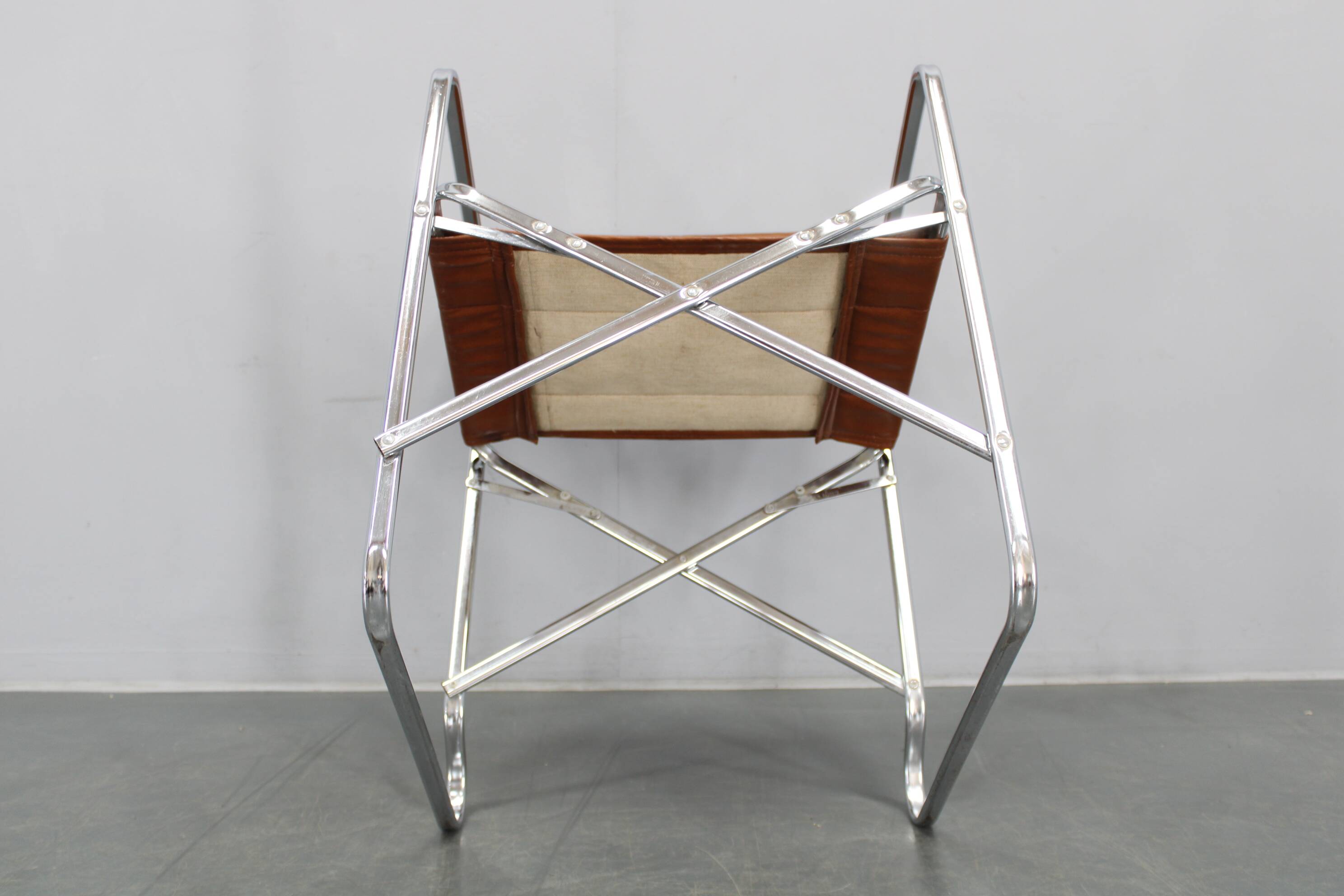 1970s pair of Italian folding chairs with leatherette upholstery
