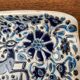 Vintage handmade blue ceramic ashtray with deer and flower ornament from Rodos Ceramics.