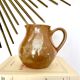 Vintage pink stoneware pitcher