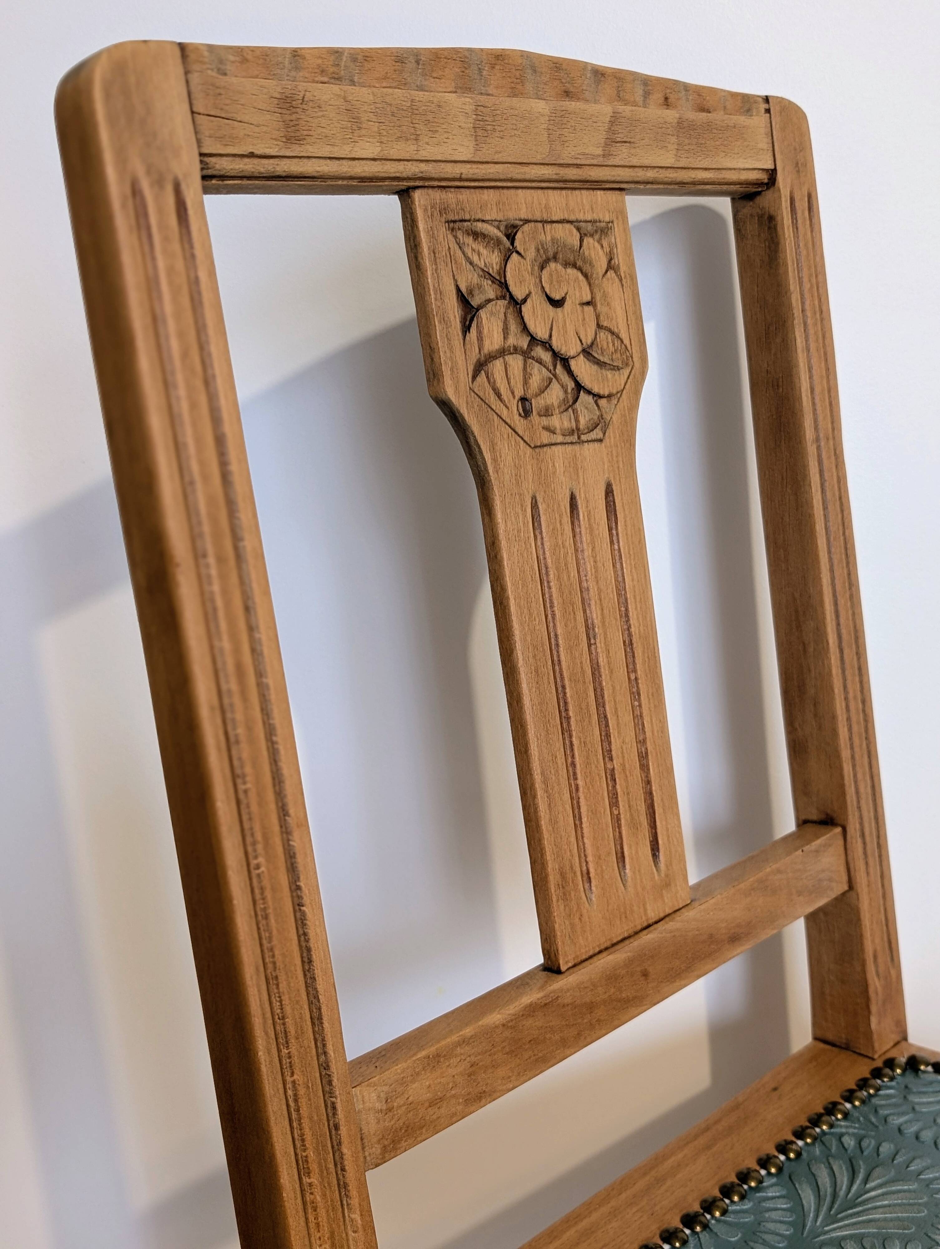 Revisited antique chair in solid wood with a sage green seat.
