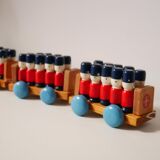 Wooden train with soldiers
