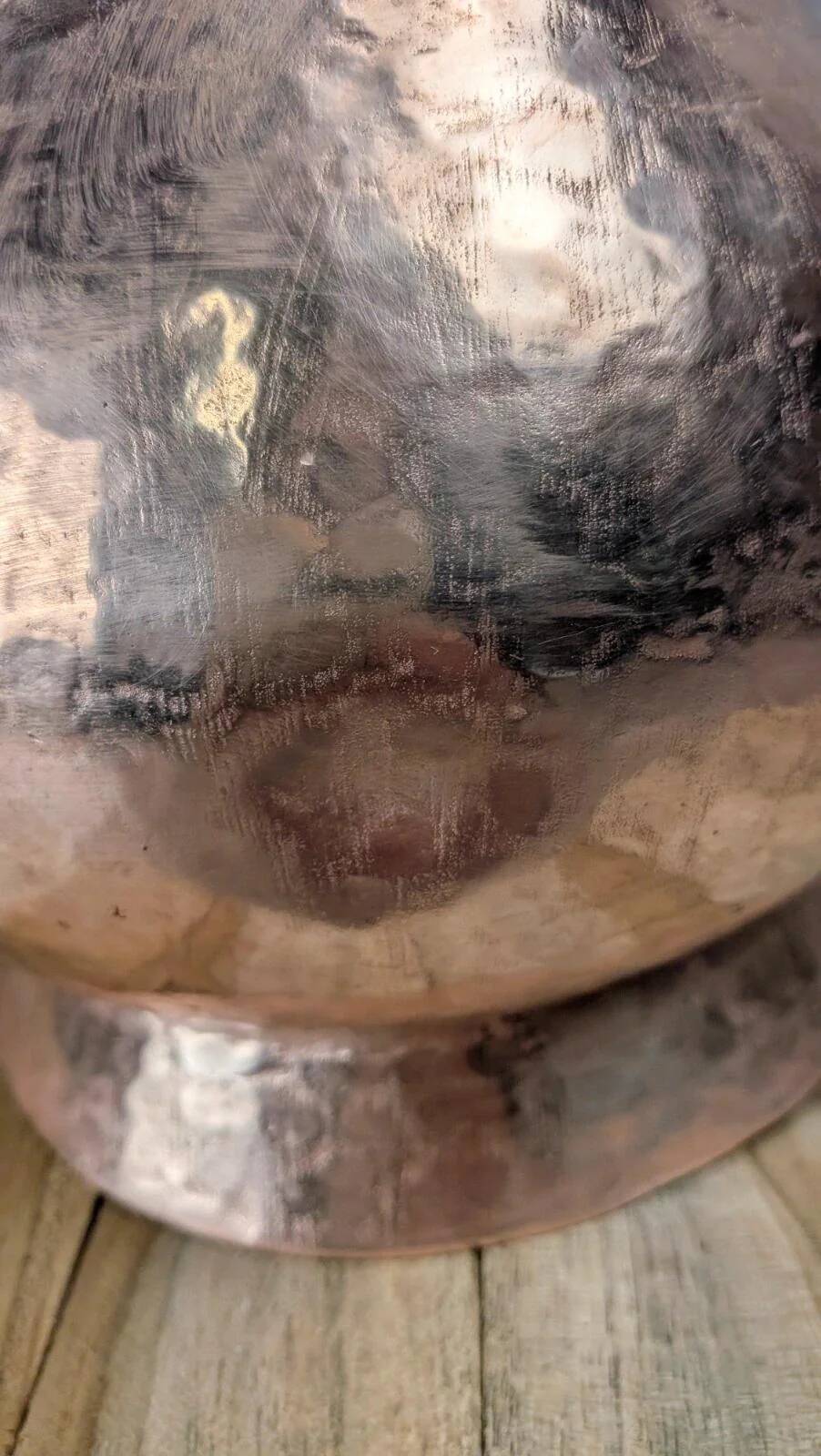 Antique hammered copper jug