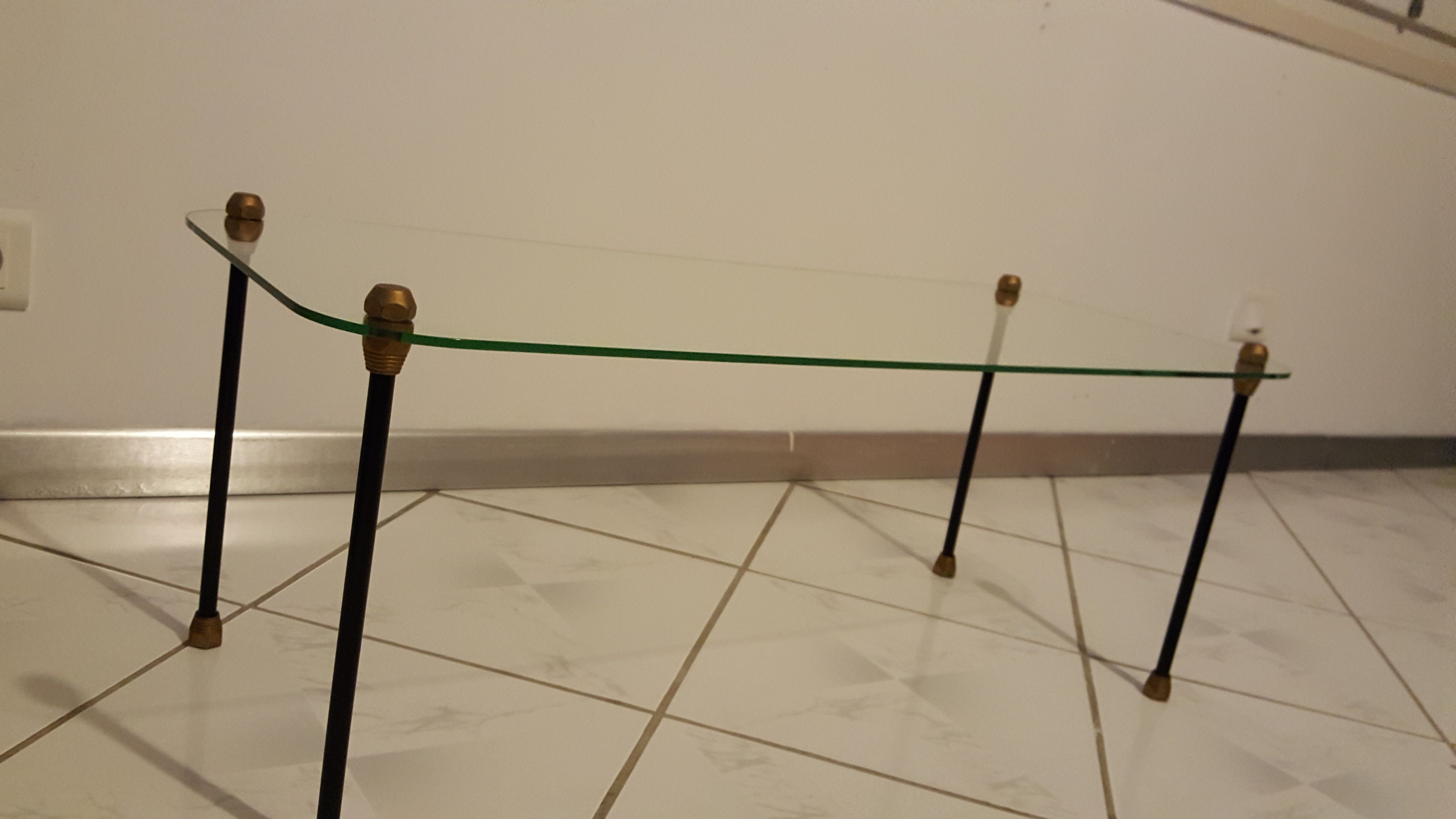 Glass table with brass tip