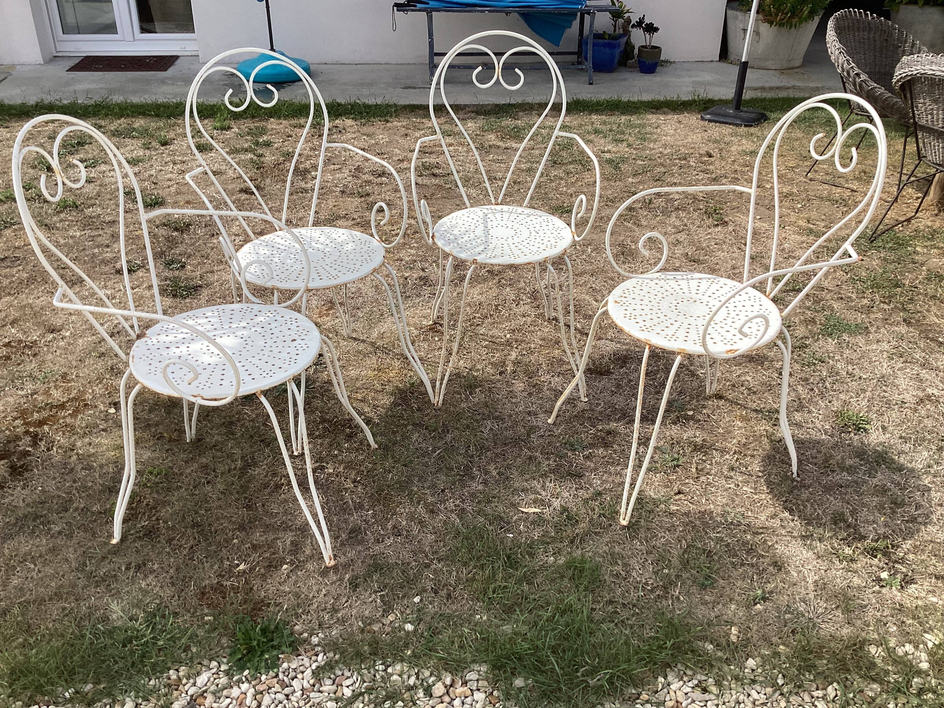 Tin garden armchairs
