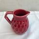 Former art deco red ceramics pitcher