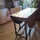 English folding table with turned legs, gateleg, in good condition, 19th century.