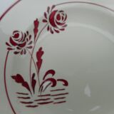 Six hollow earthenware plates