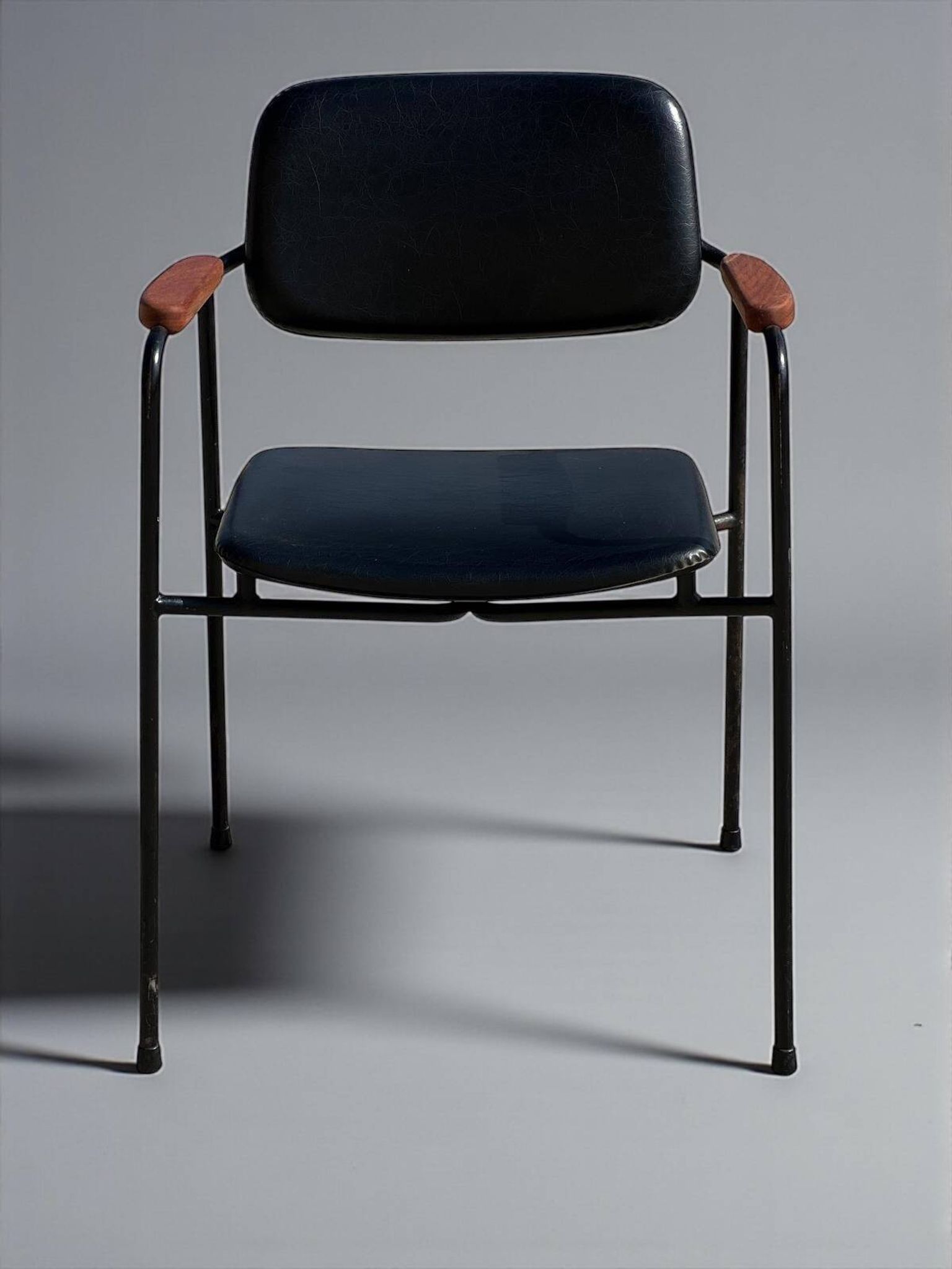 Armchair Eugen Schmidt, black faux leather model Coraline for Airborn 1960.