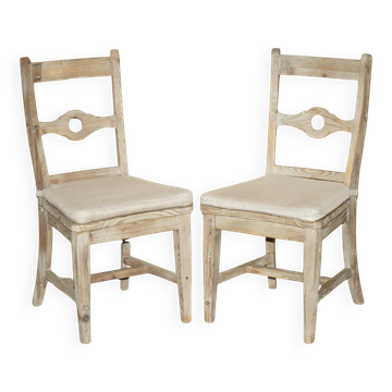 Pair of Swedish-style accent chairs in recycled pine with upholstered seats.