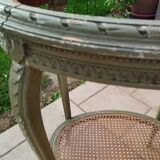 Old oval table with marble top, Louis XVI style