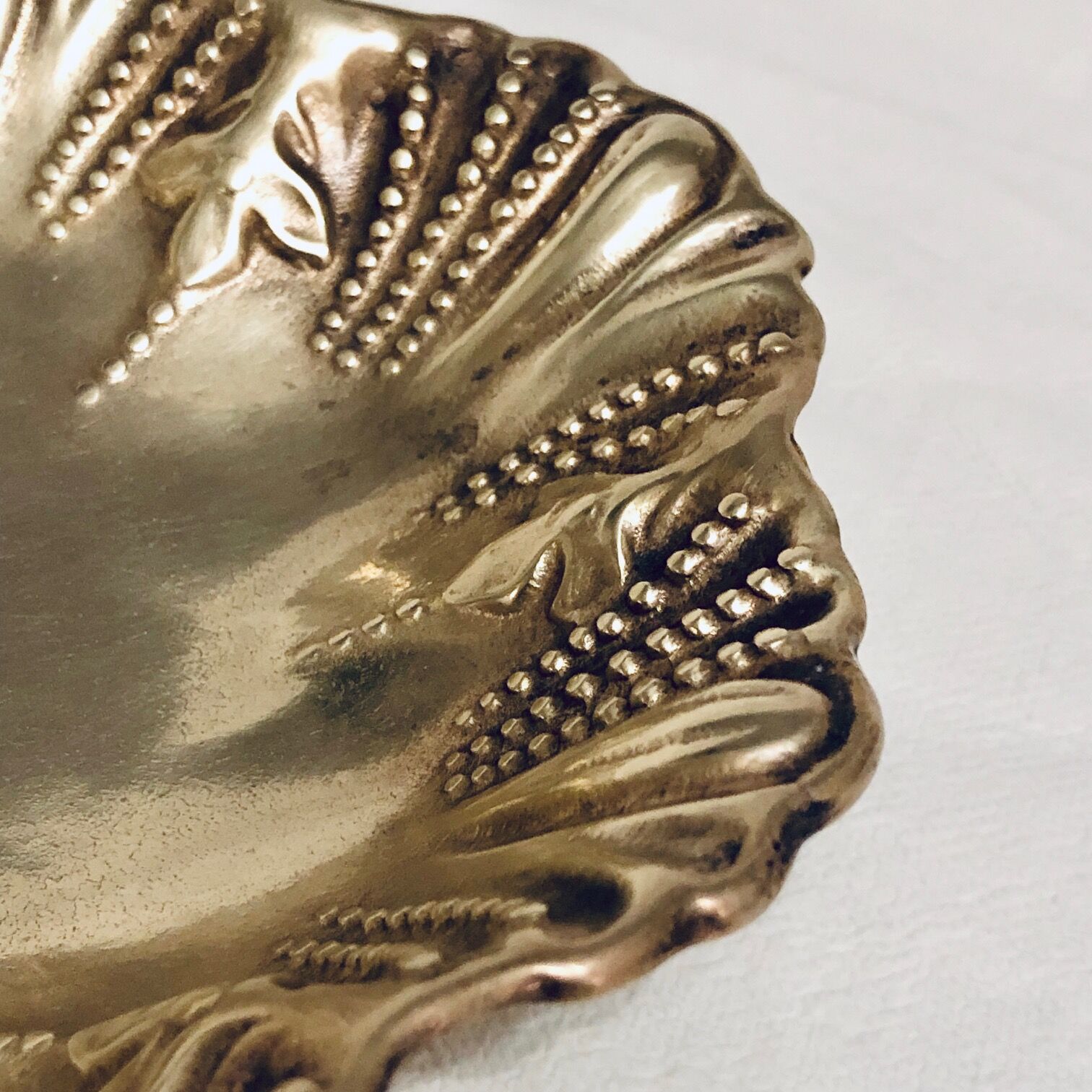 Empty oval brass pocket