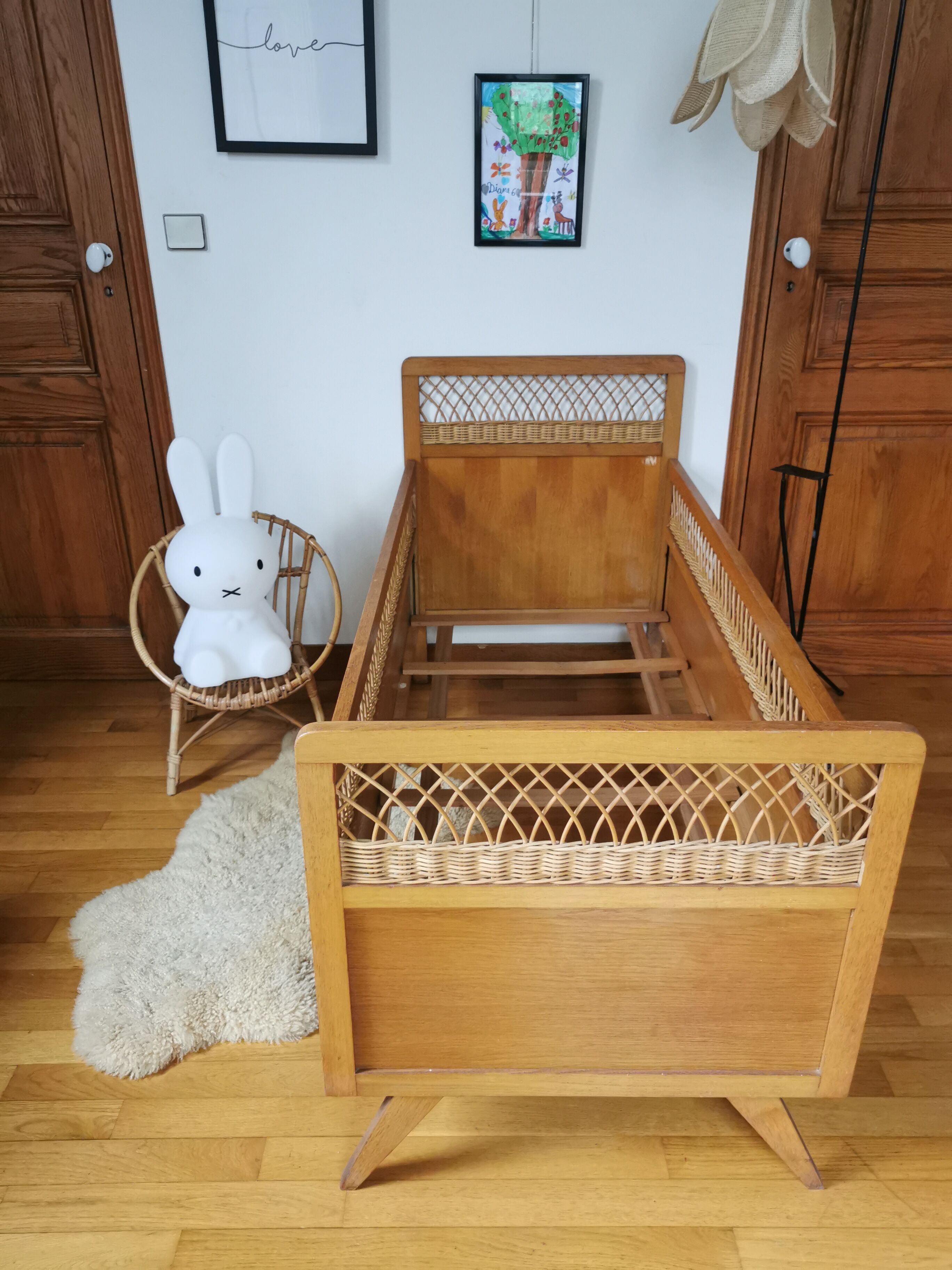 Vintage rattan child bed from the 60s