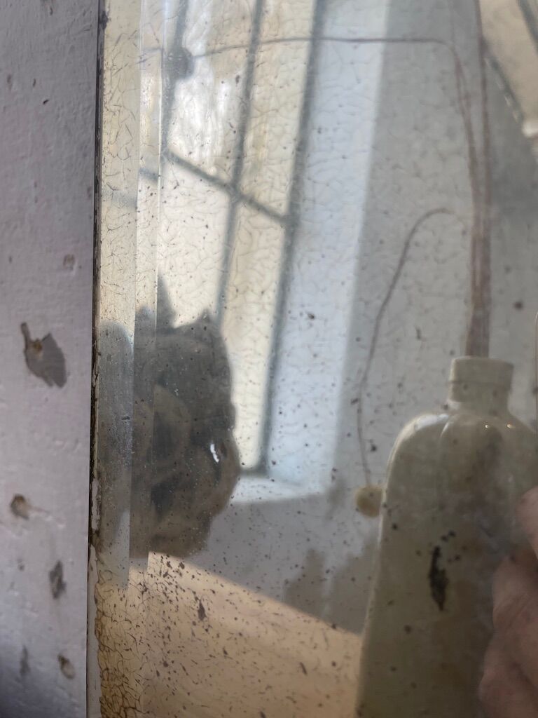 Very stung old bevelled mirror 39x60cm