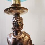 Large kerosene lamp mounted on bronze statue. Late nineteenth century