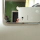 Vintage barber mirror with chain