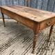 Antique cherry farmhouse table with 2 drawers and 1 pull-out