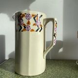 Porcelain pitcher with floral motifs
