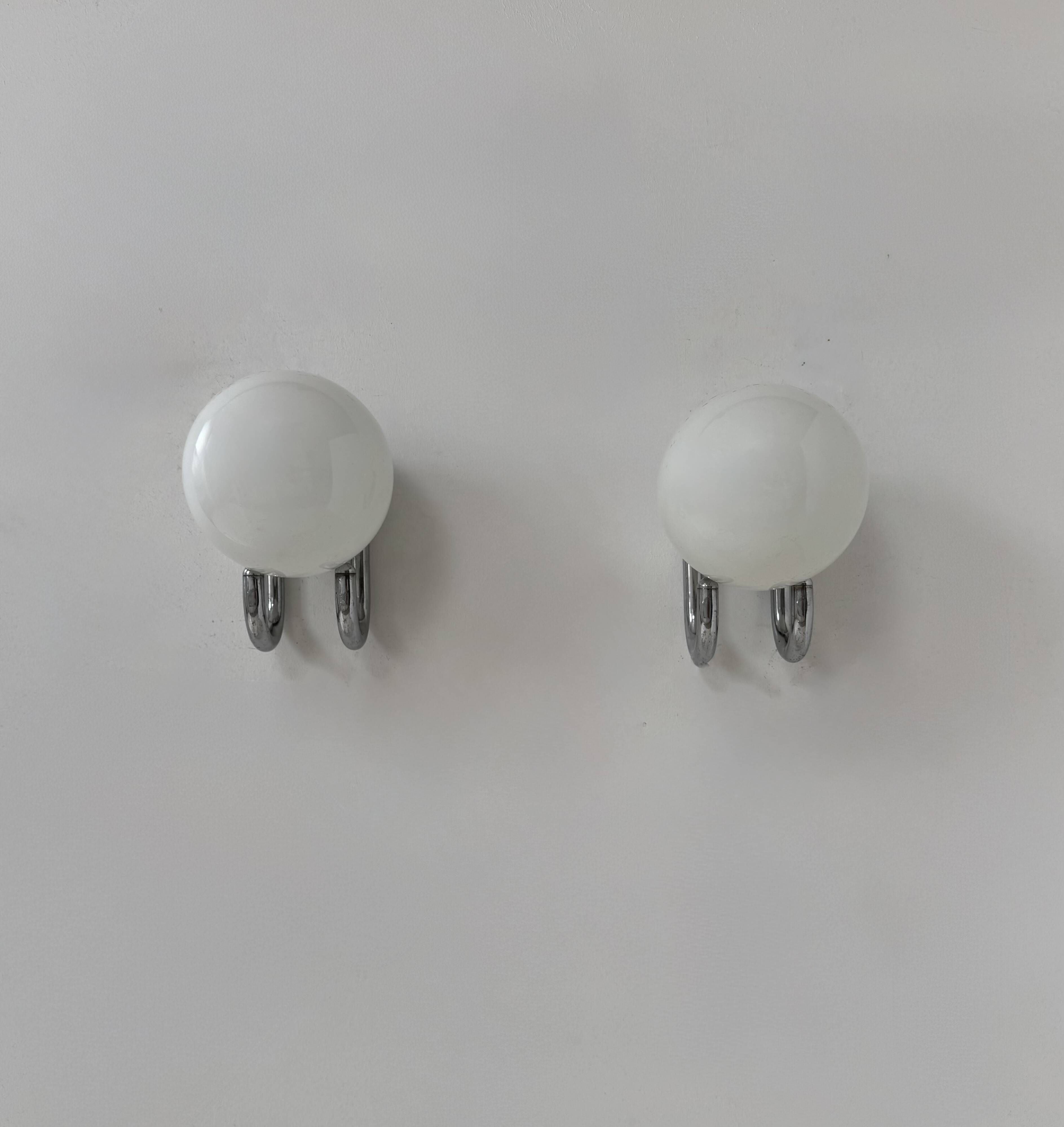 Pair of vintage wall lights, chrome metal and opaline, France, 1960.