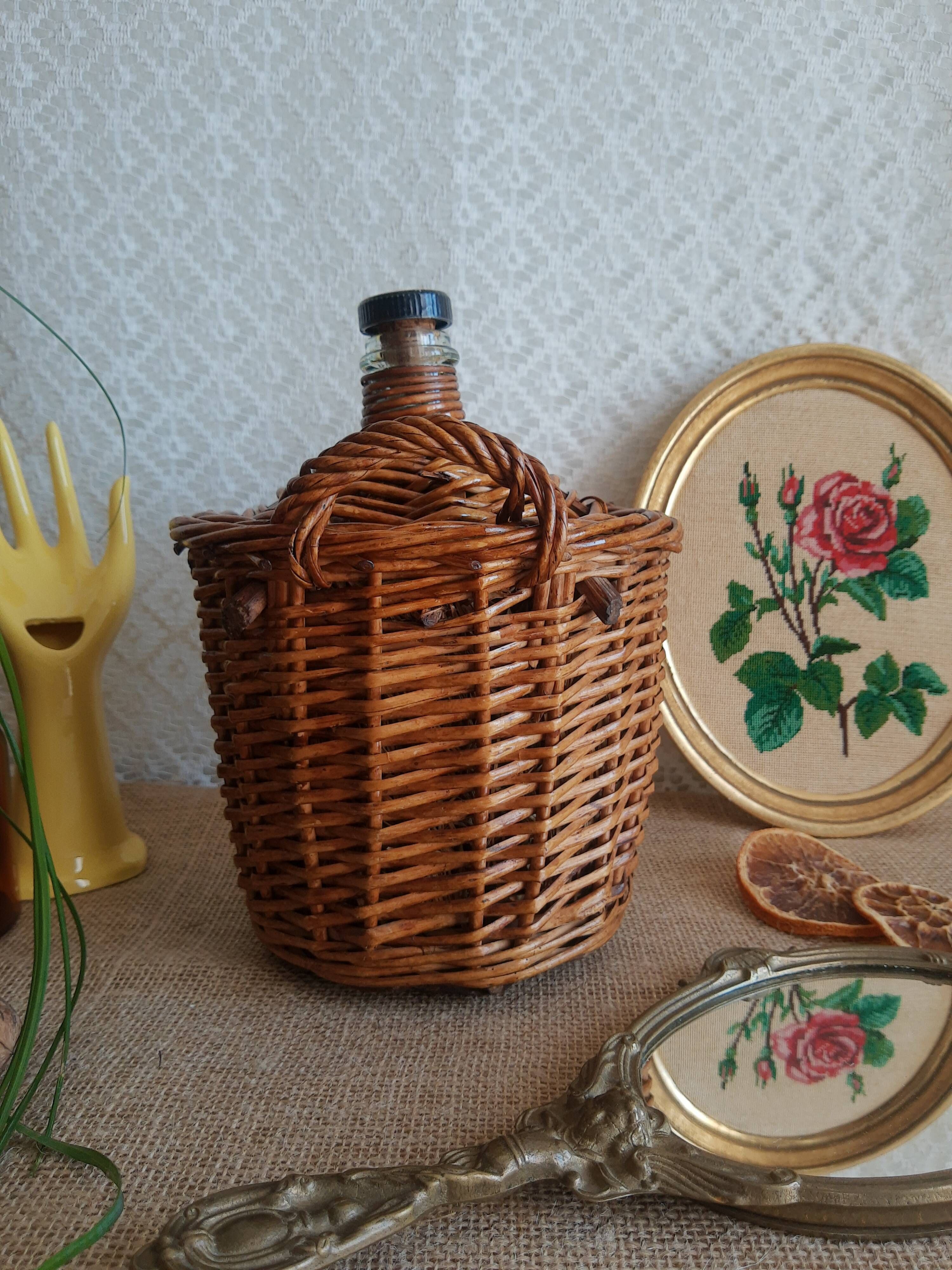 Small canister demijohn in glass circled with wicker - vintage
