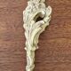 2 ornaments and an antique bronze pediment