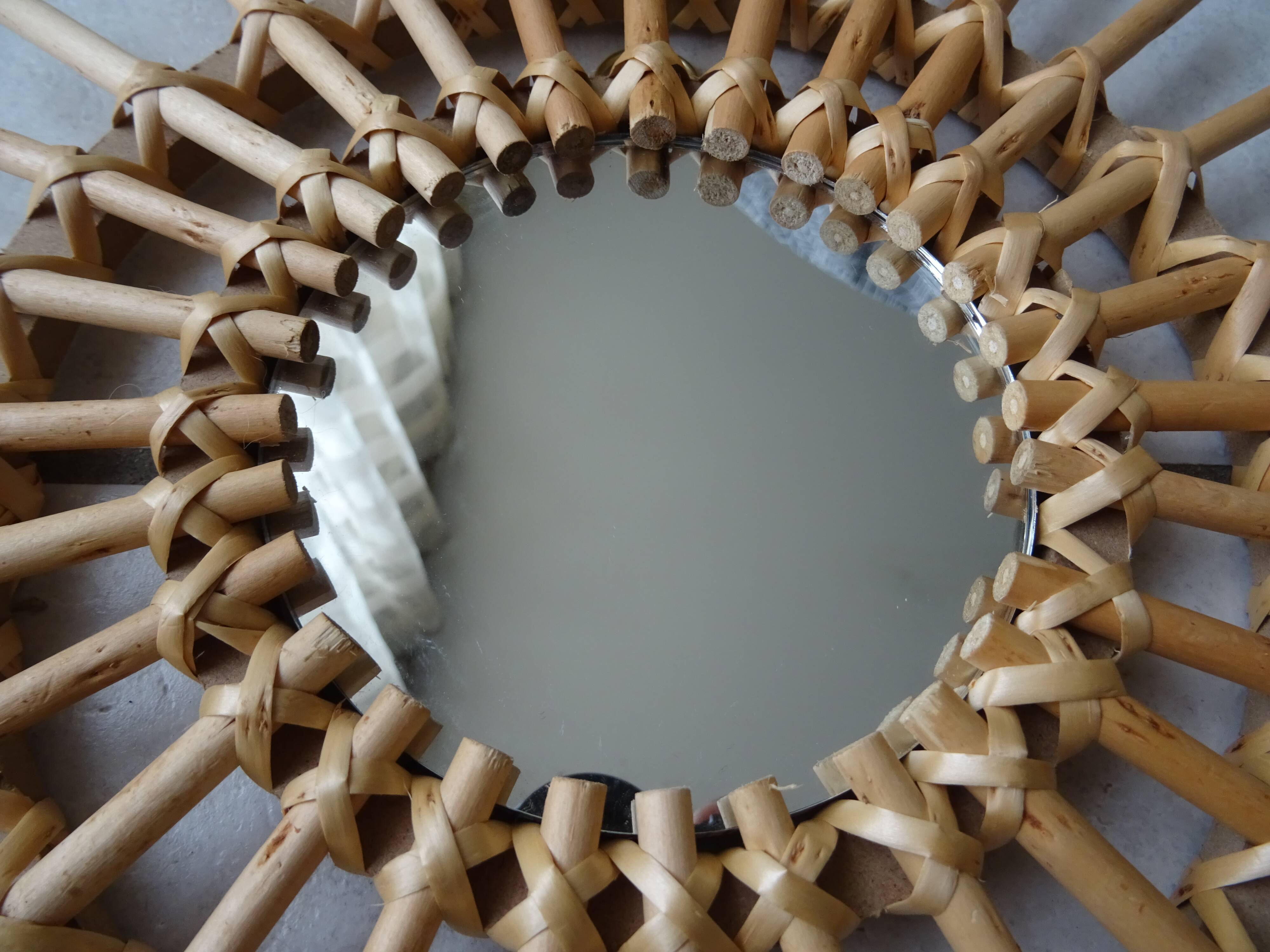 Vintage sun rattan mirror
