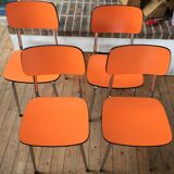 Lot of 4 vintage chairs in orange formica