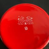 Red enameled sheet metal mug