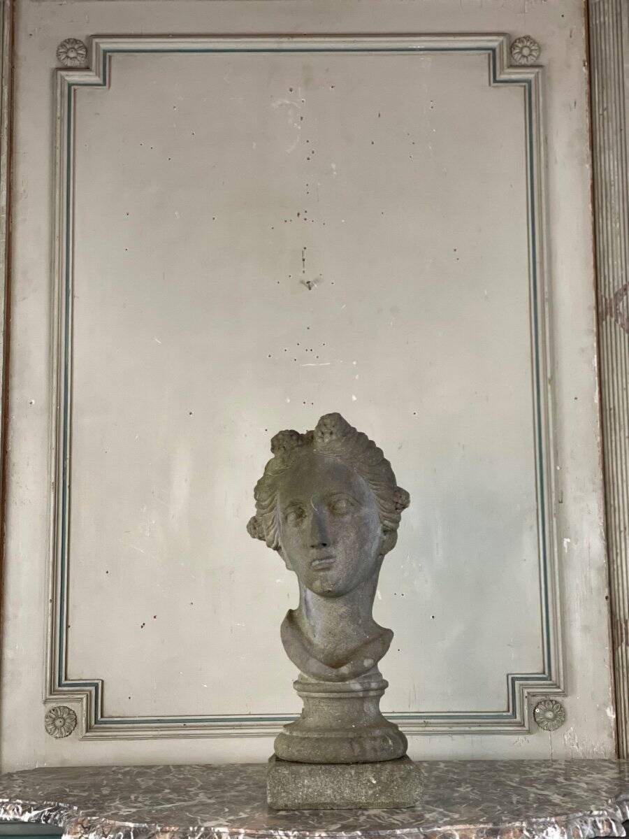Female bust sculpted in stone