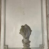 Female bust sculpted in stone