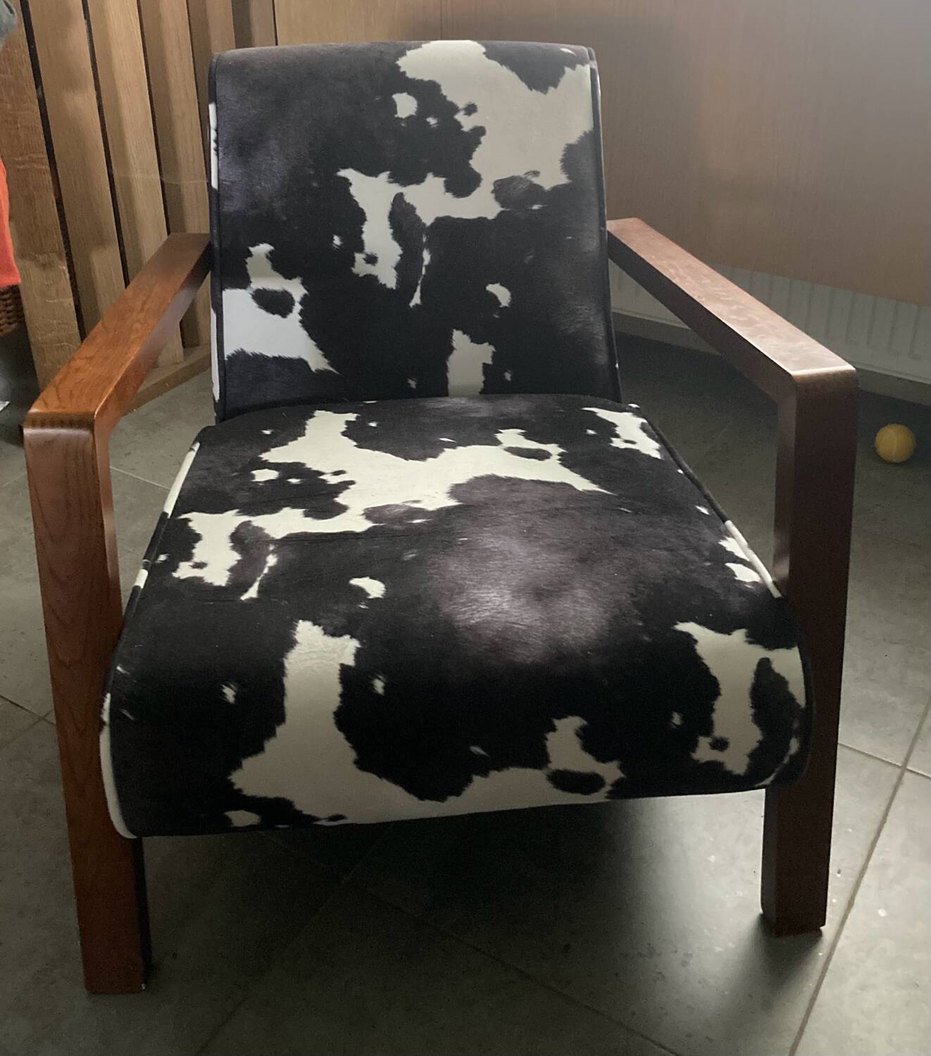 Armchair in walnut and animal print velvet