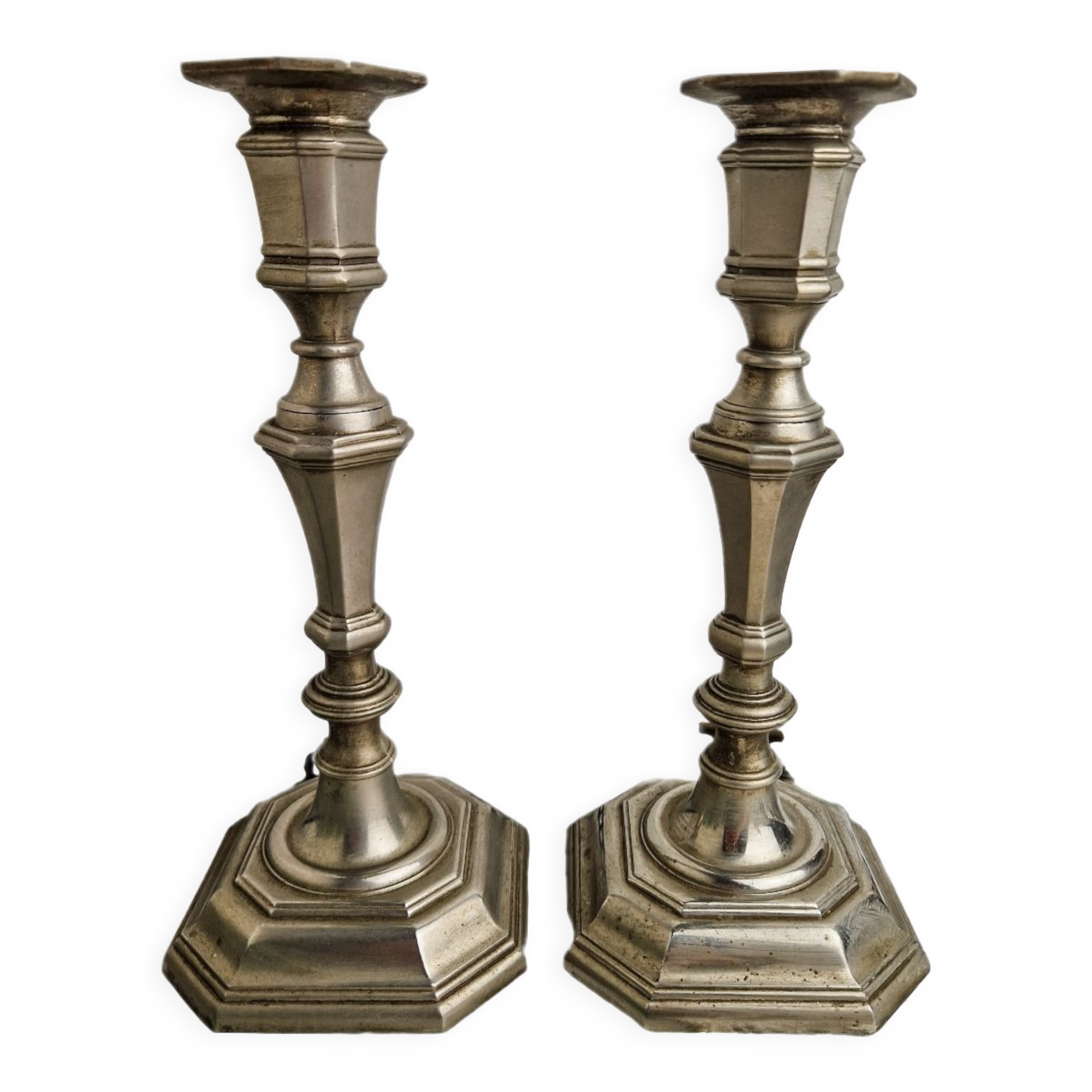 Pair of neo classical style candle holders in silver metal