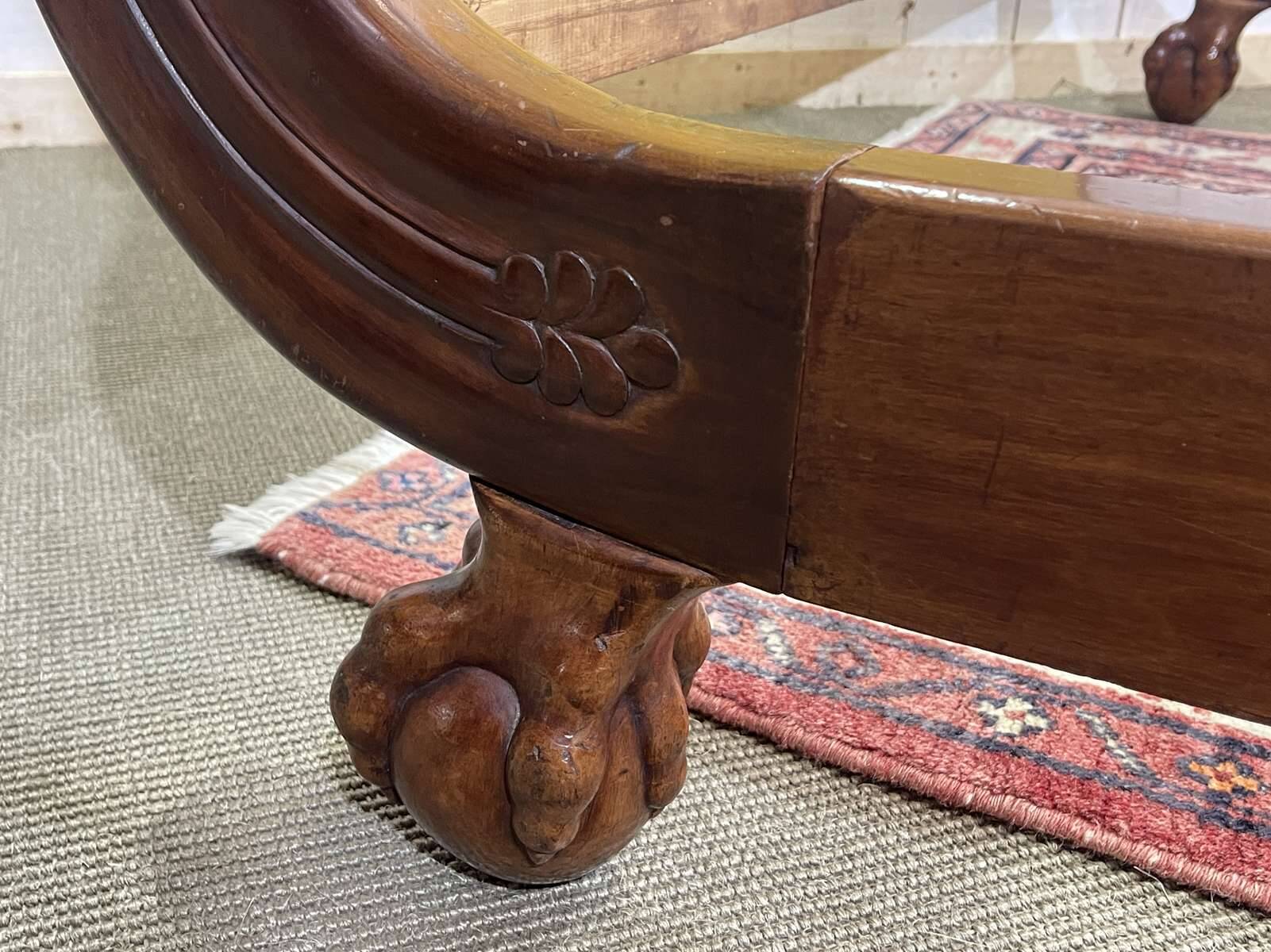 Early 19th century Empire mahogany bed with swan neck finials and claw feet