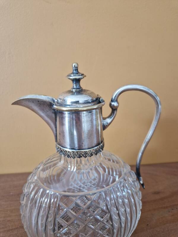 Cut crystal carafe and silver-plated metal