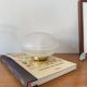 Vintage desk table lamp with antique glass and brass base.