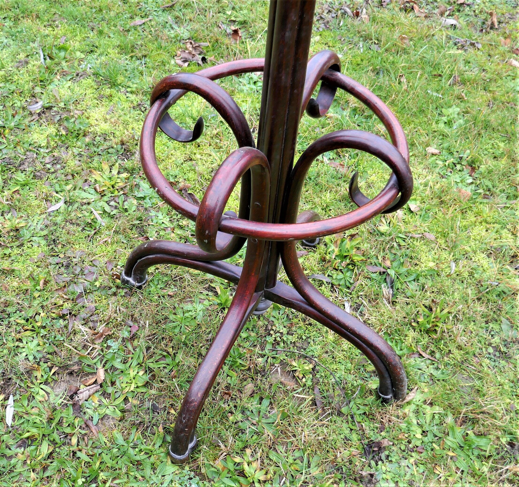 Old bistro parrot coat holder