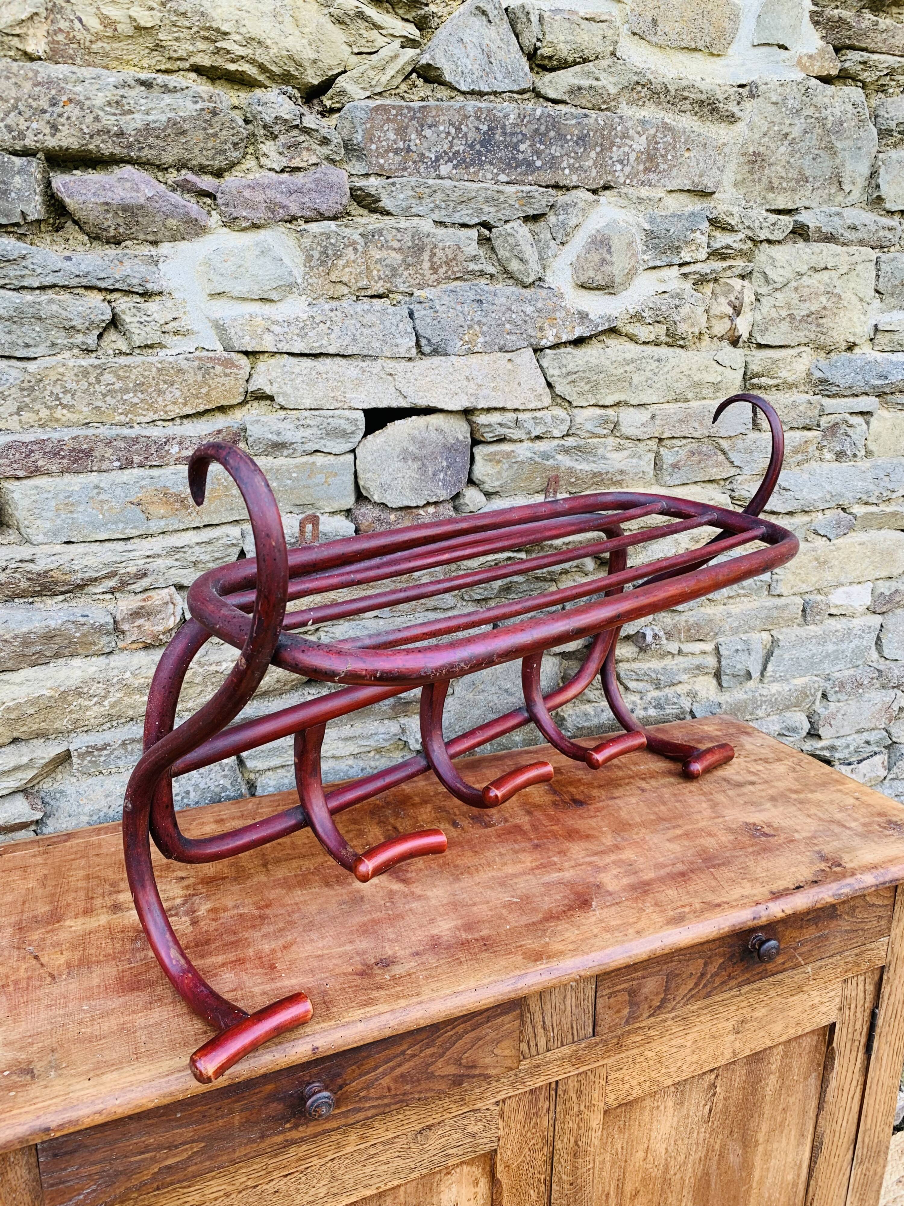 Antique curved wooden wall coat rack