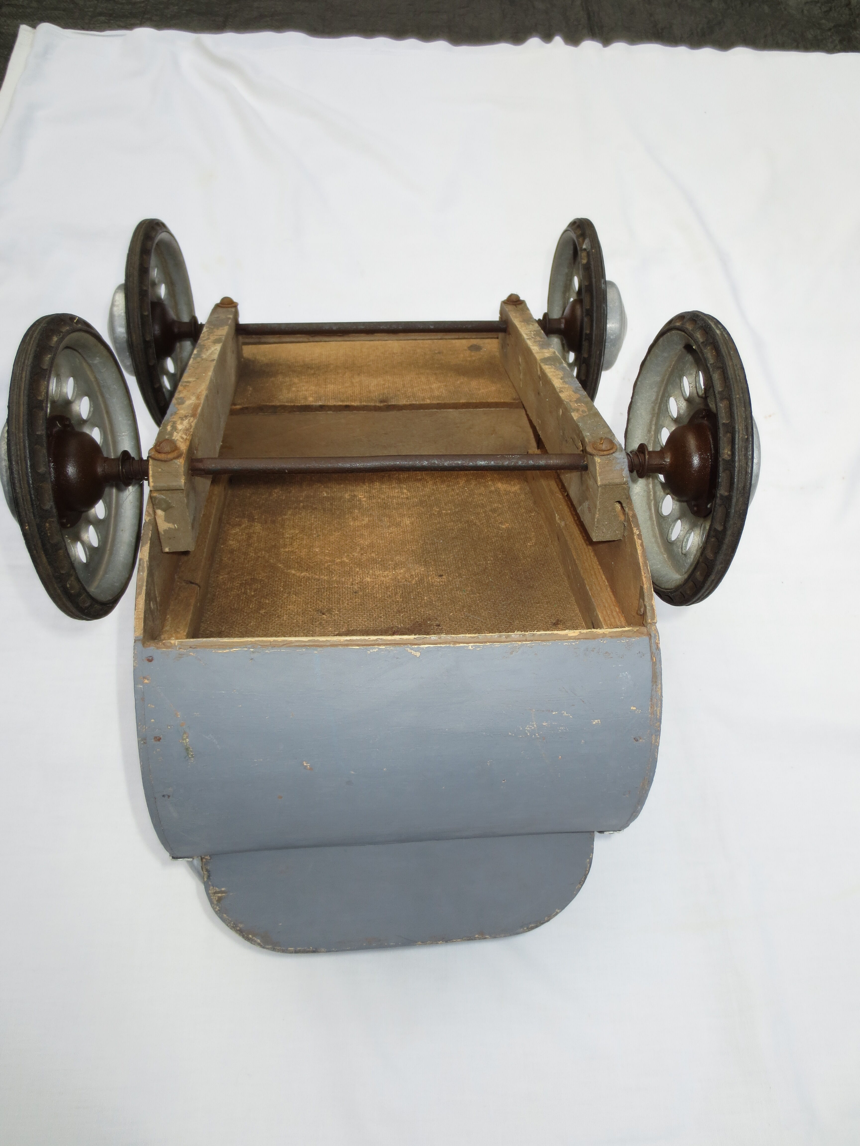 40 year old doll stroller, wood and aluminum