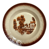 Earthenware plate from Moulin des Loups with stencil pattern.