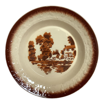 Earthenware dish with wolf mill stencil pattern