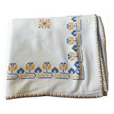 Embroidered white tablecloth