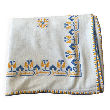 Embroidered white tablecloth
