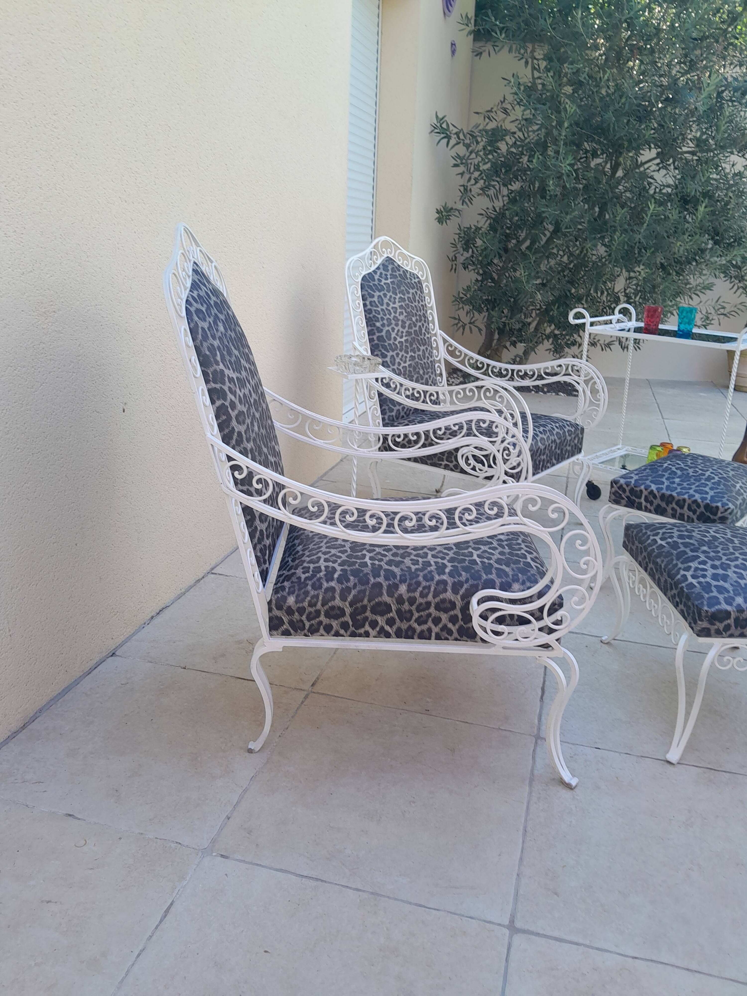 Pair of ottoman armchairs with wrought iron serving trolley, vintage garden, old design