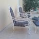 Pair of ottoman armchairs with wrought iron serving trolley, vintage garden, old design