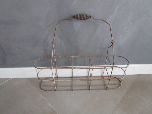 Old metal bottle holder