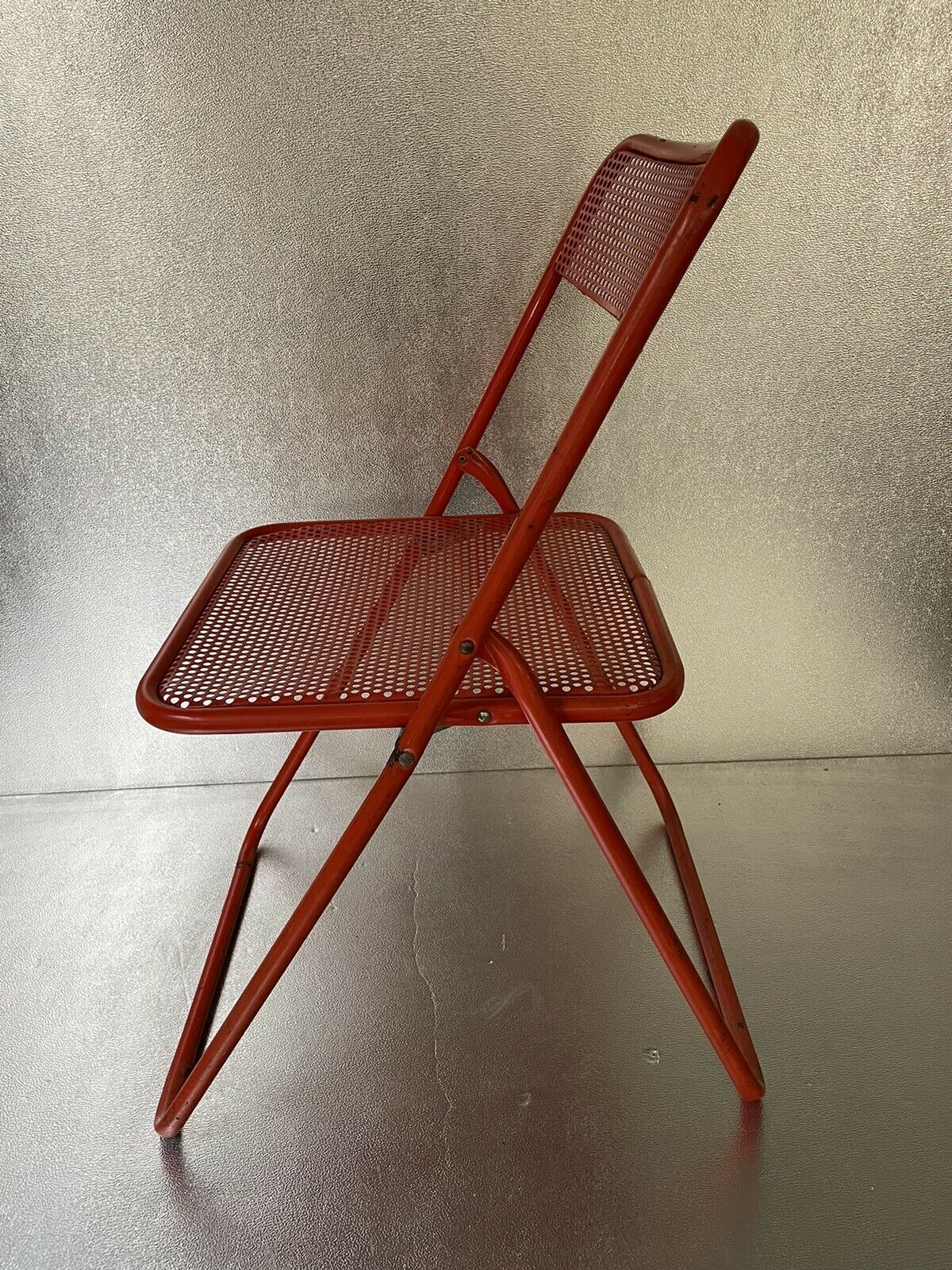 Old folding chair metal perforated red 60s, 70s, vintage