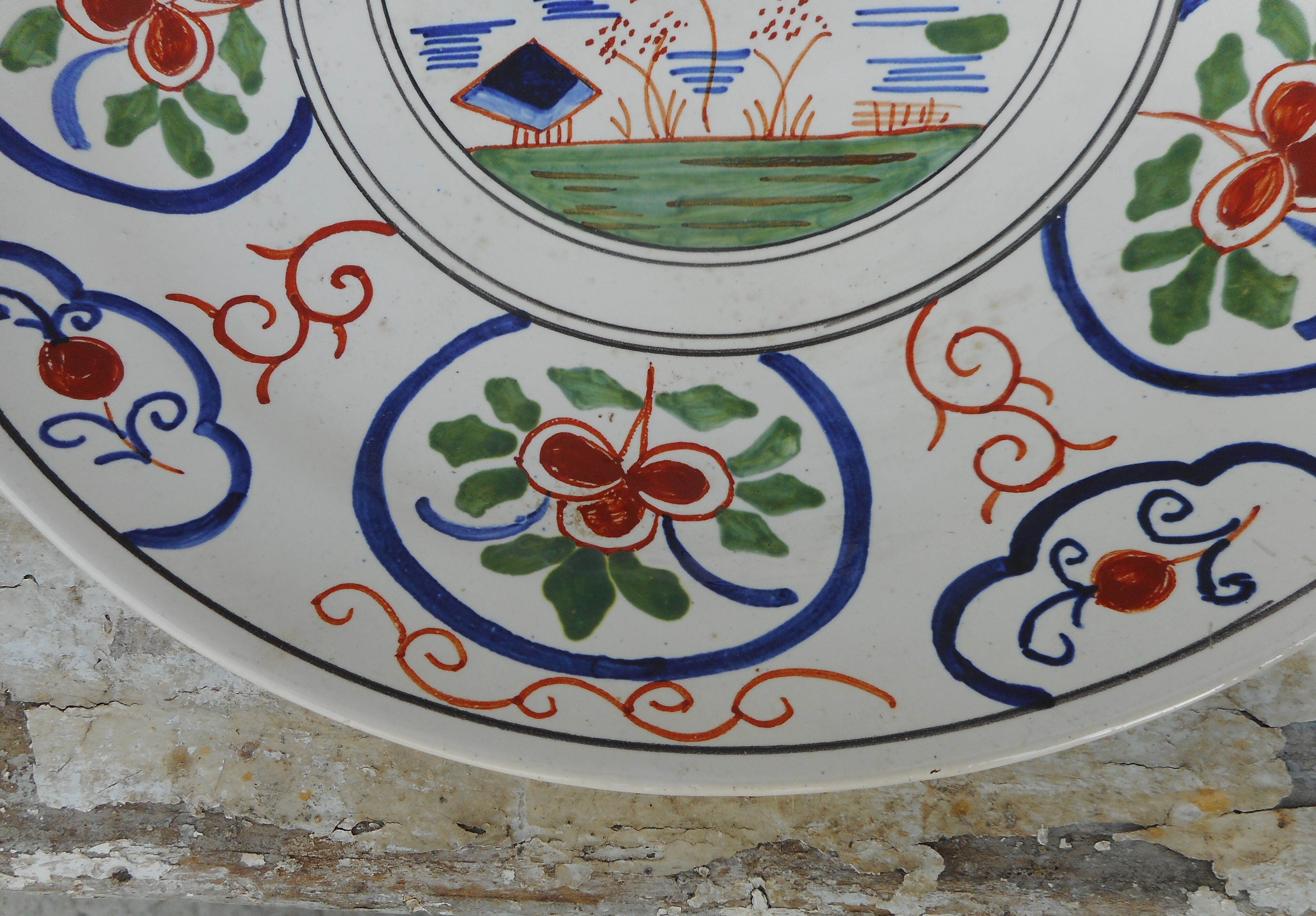 Ancient plate in earthenware