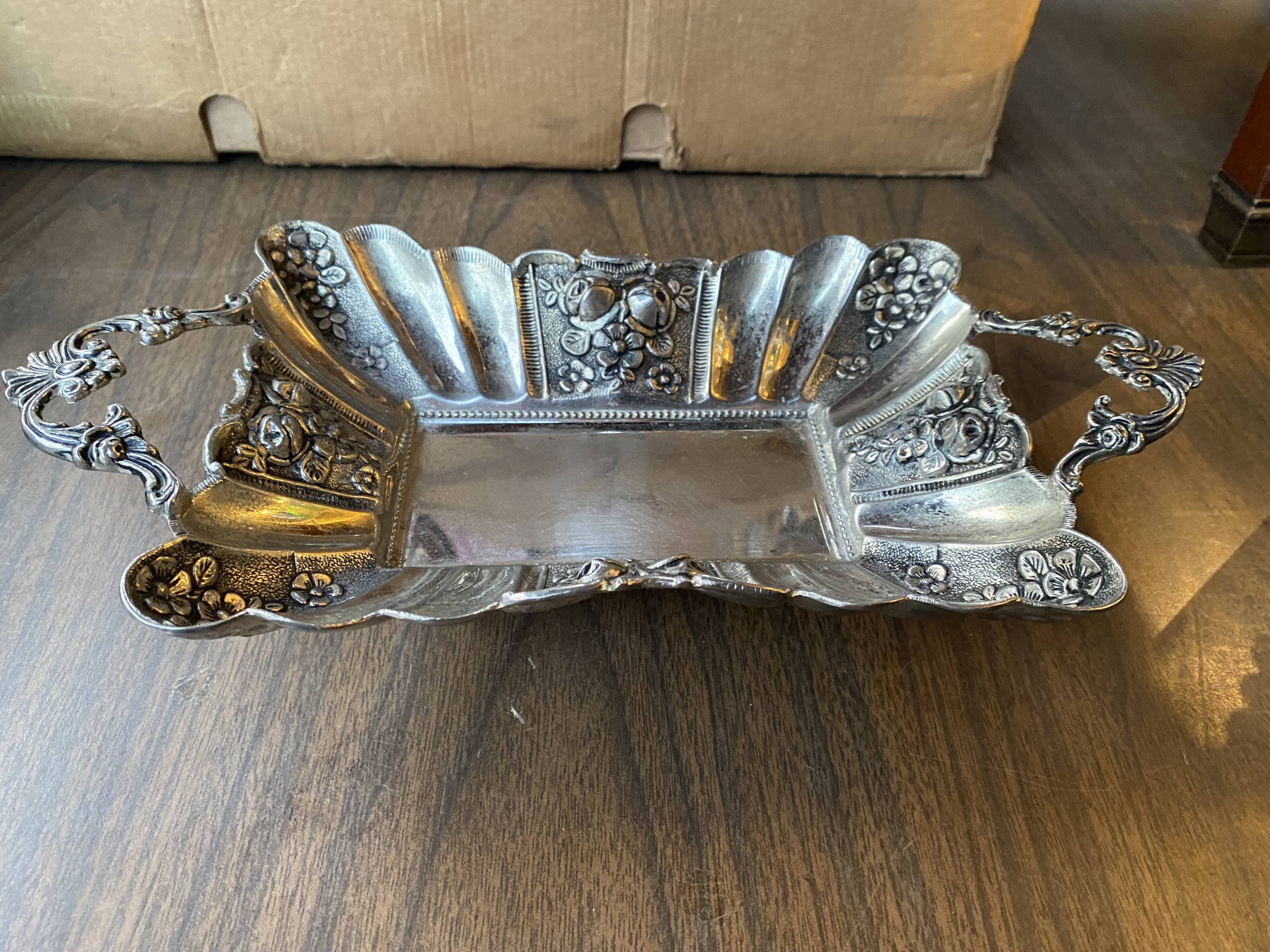 Empty pocket in silver metal